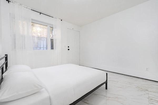 Preview 0 of #1792: Queen Room B at June Homes