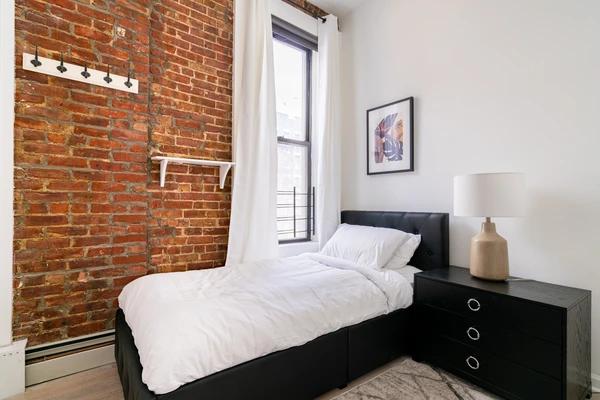 Preview 0 of #1114: Twin Bedroom C/w Private Bathroom at June Homes