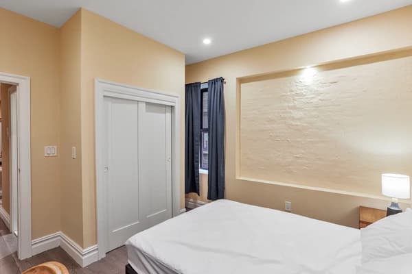 Preview 1 of #1911: Queen Bedroom A at June Homes