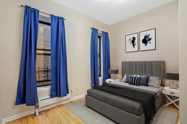 Preview 0 of #711: Queen Bedroom B at June Homes
