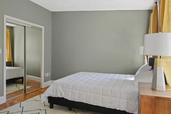 Preview 1 of #1683: Queen Bedroom A at June Homes