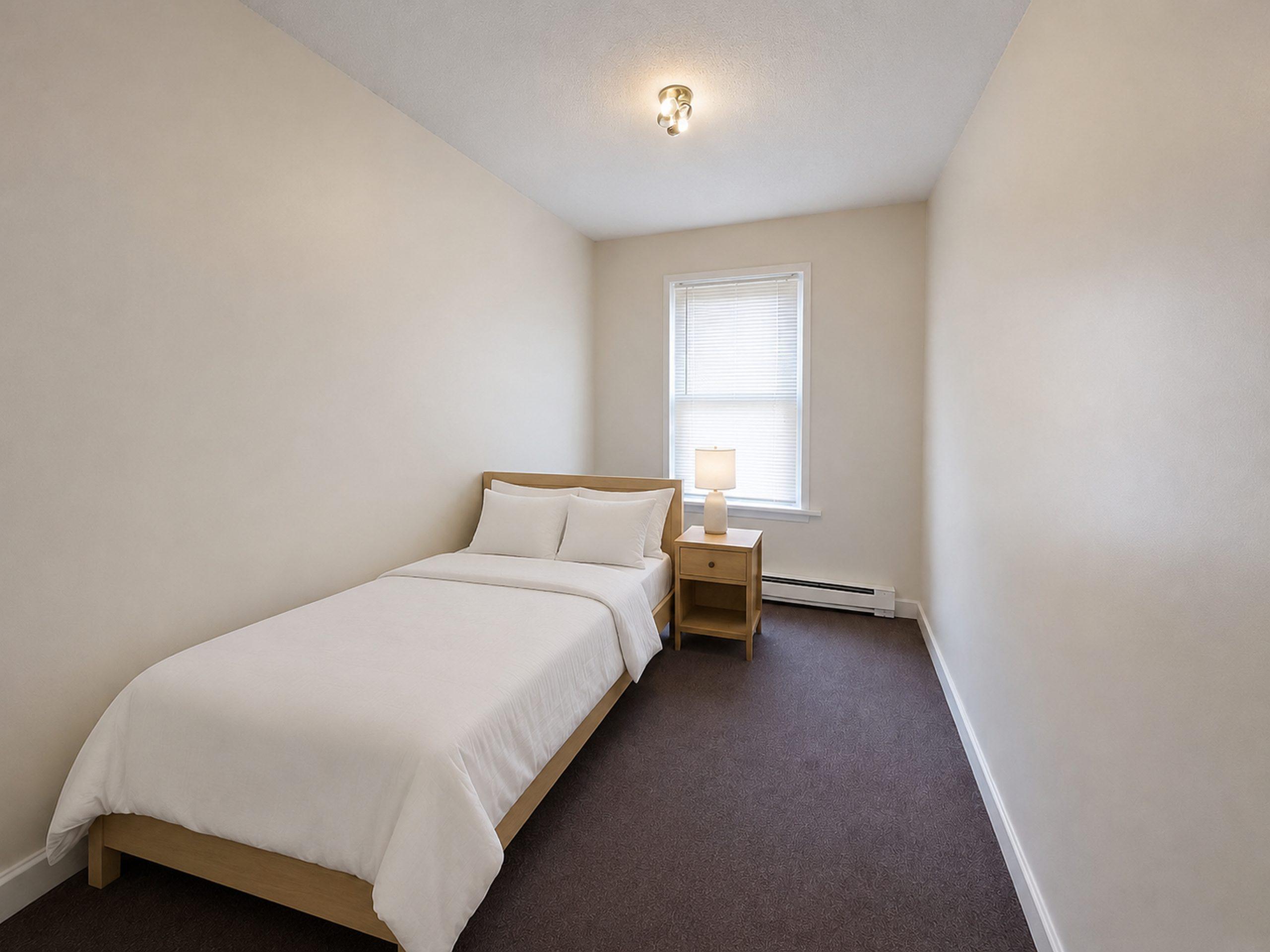 Photo 1 of #1885: Queen Bedroom A at June Homes