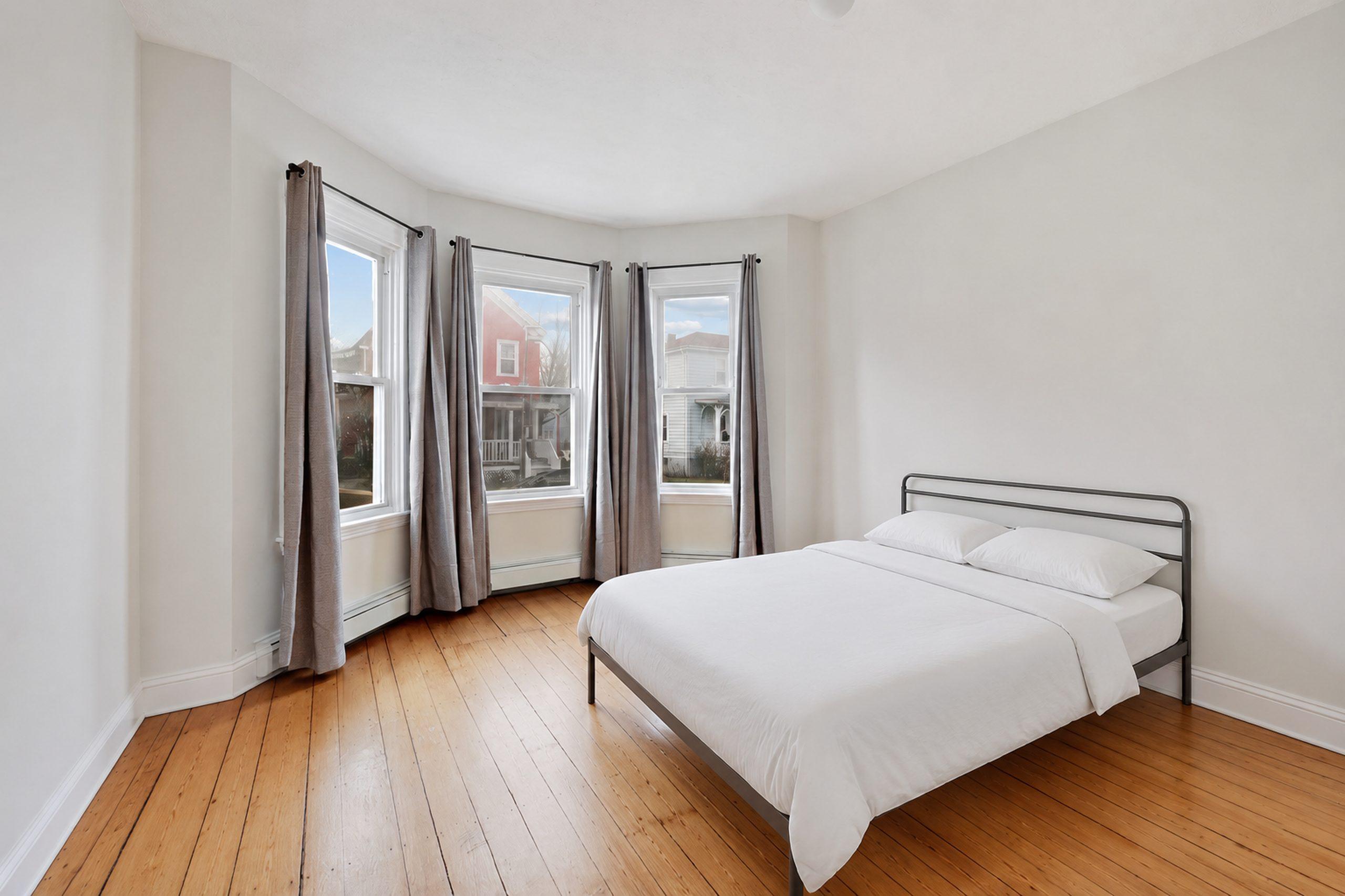 Photo 1 of #888: Queen Bedroom A at June Homes