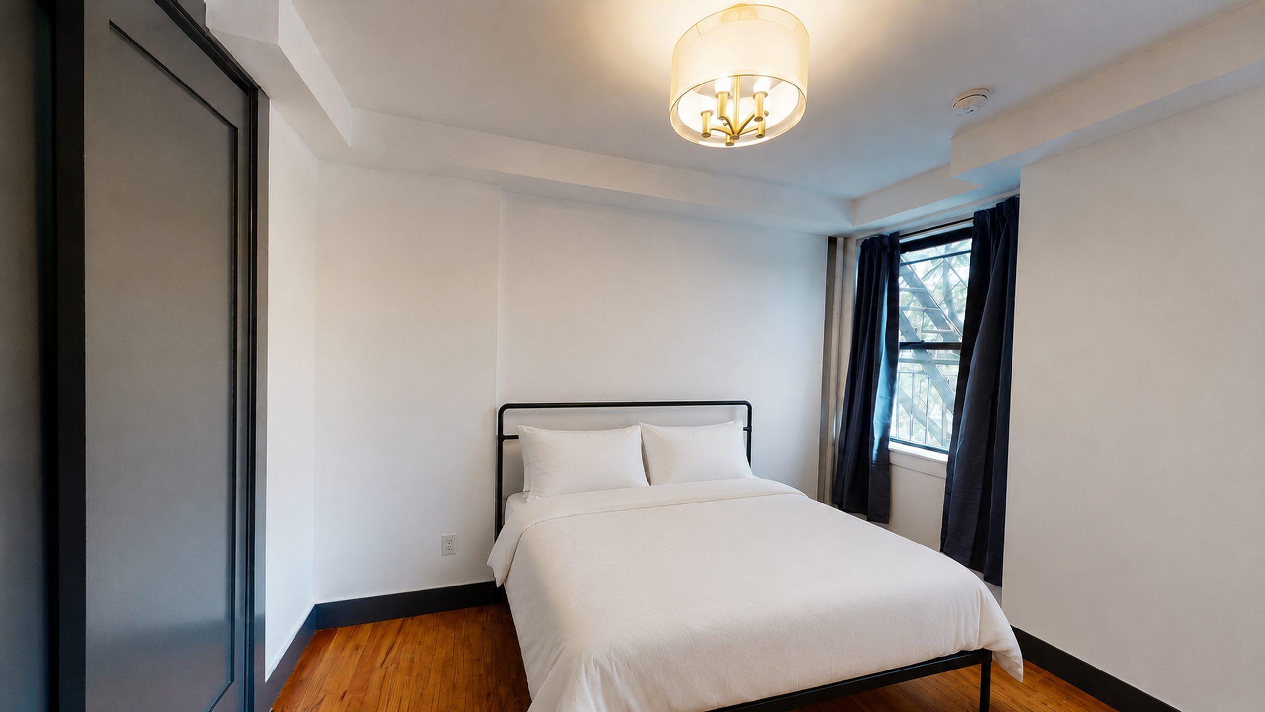 Photo 1 of #485: Queen Bedroom B at June Homes