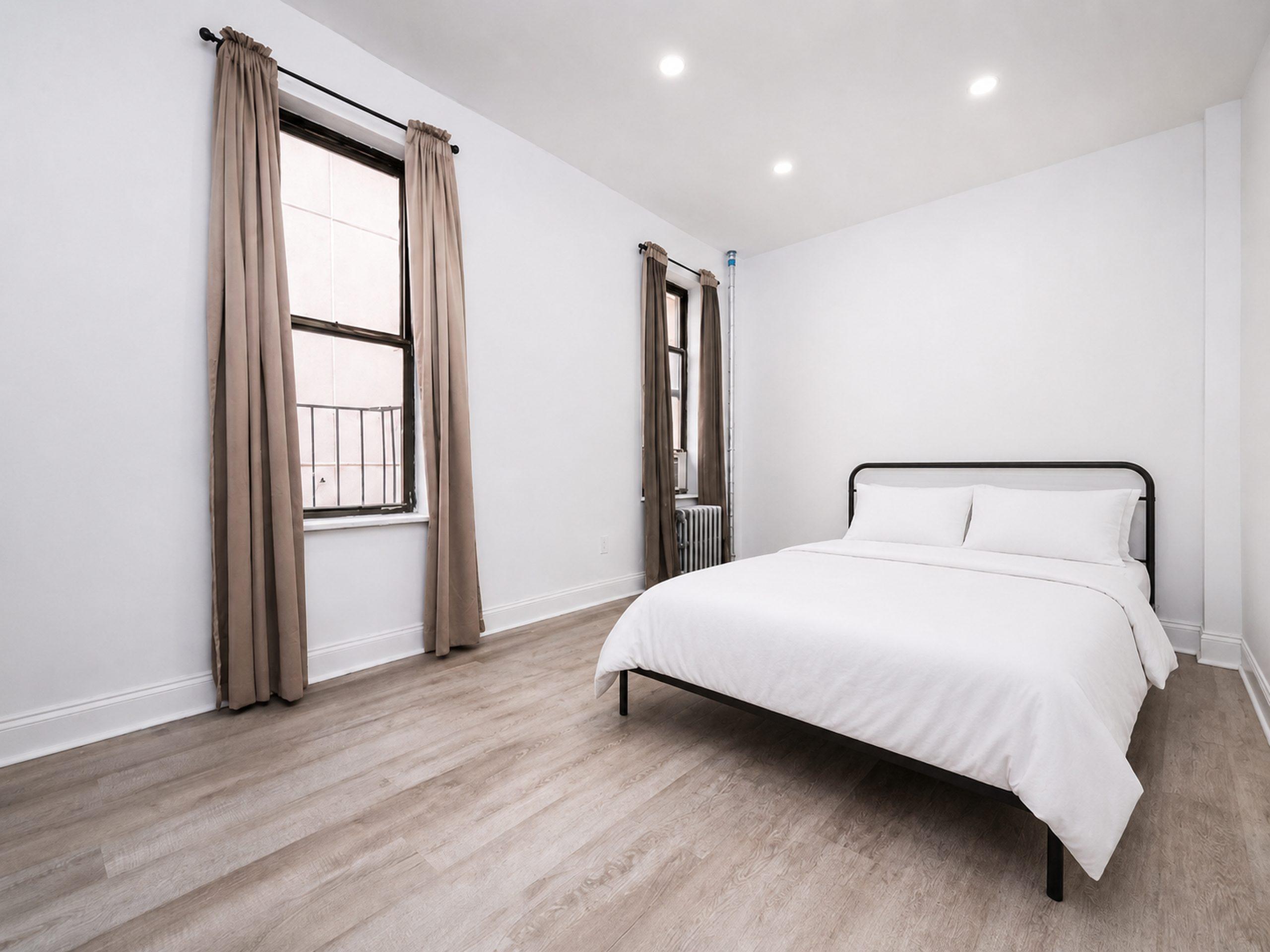 Photo 1 of #703: Queen Bedroom B at June Homes