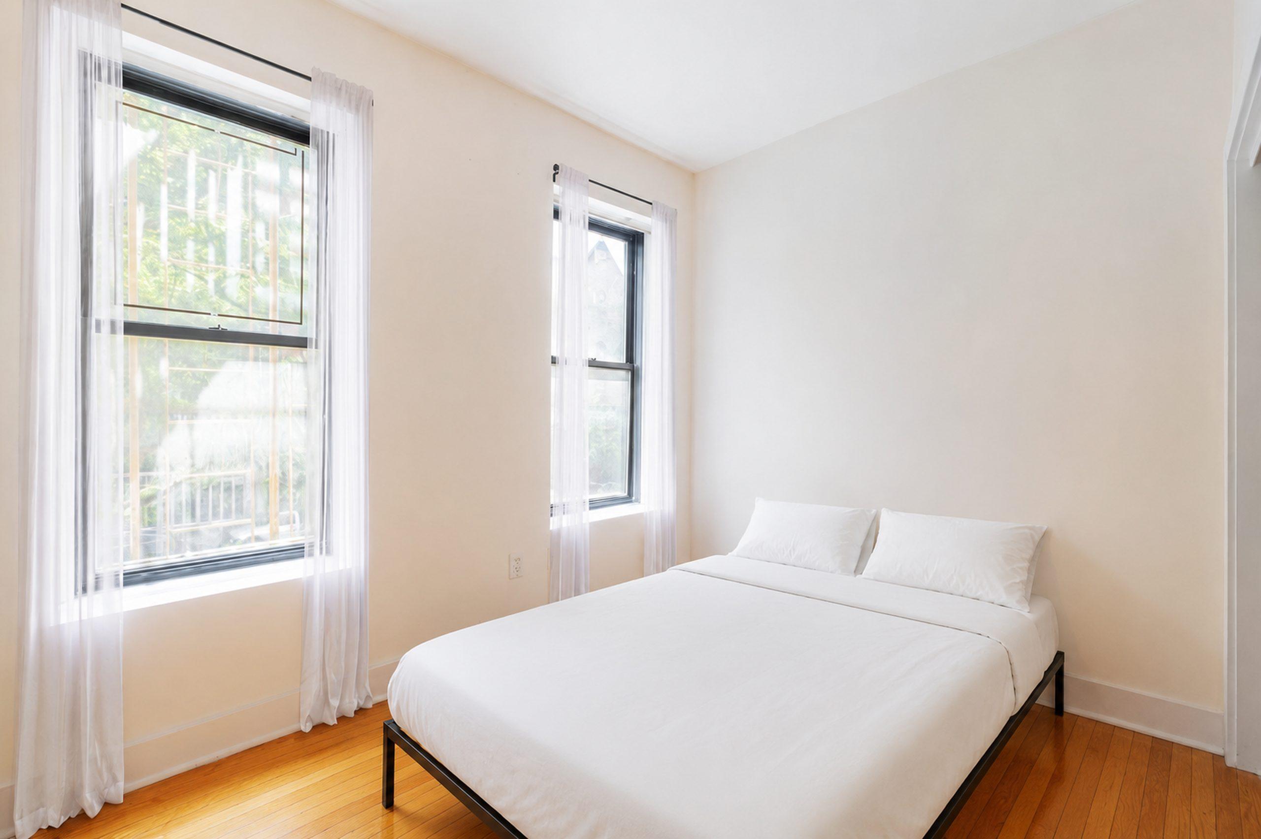 Photo 1 of #1305: Queen Bedroom B at June Homes