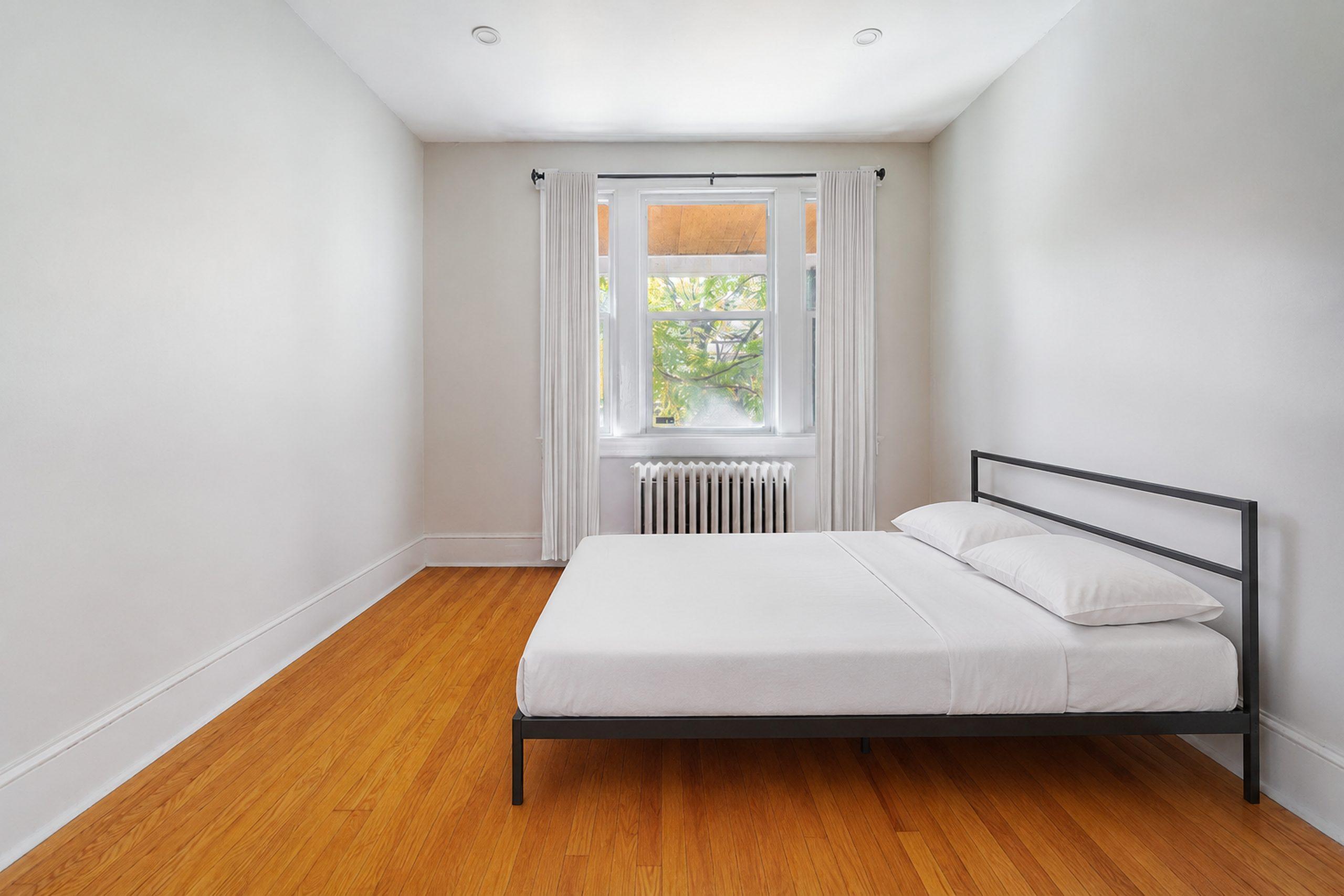 Photo 1 of #1590: Queen Bedroom A at June Homes