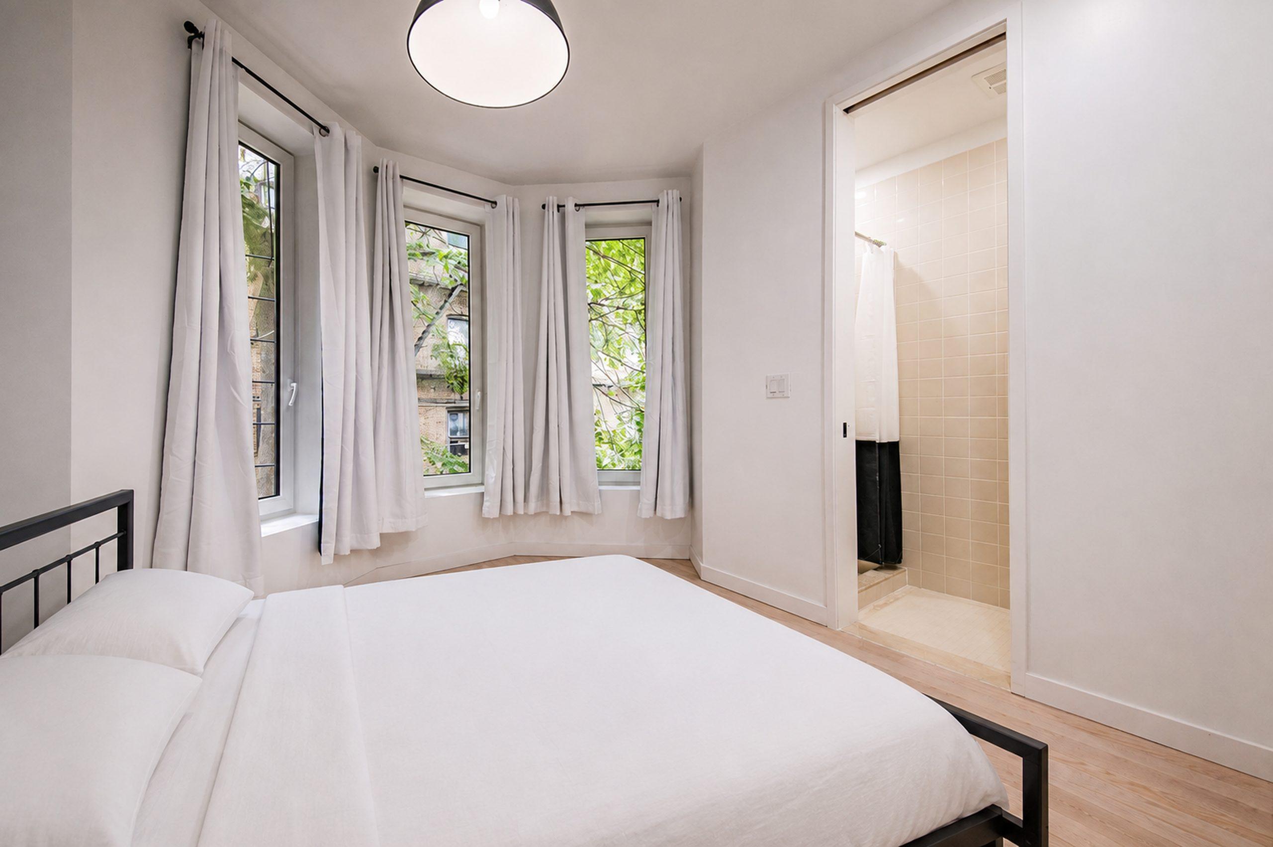 Photo 1 of #1893: Queen Bedroom D w/ Private Bathroom at June Homes