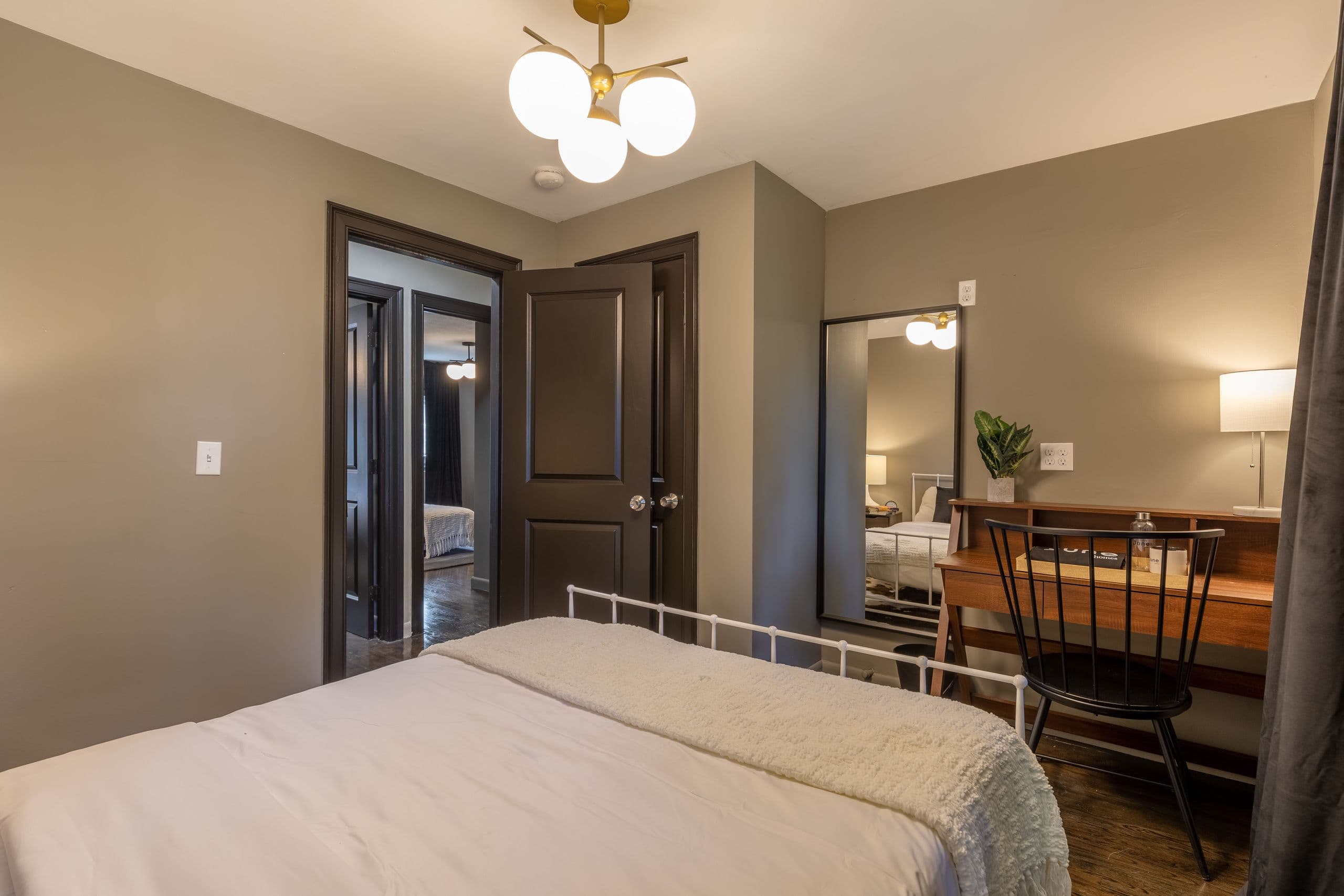 Photo 11 of #425: Queen Bedroom E at June Homes