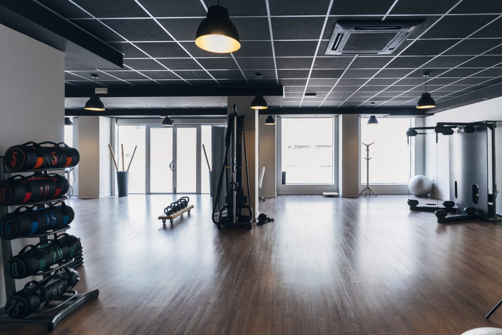 Well-equipped weight room in an apartment complex, for an article on 'How to Market Your Apartment for Rent