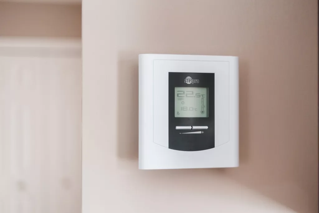 White and gray thermostat at 19 5 photo