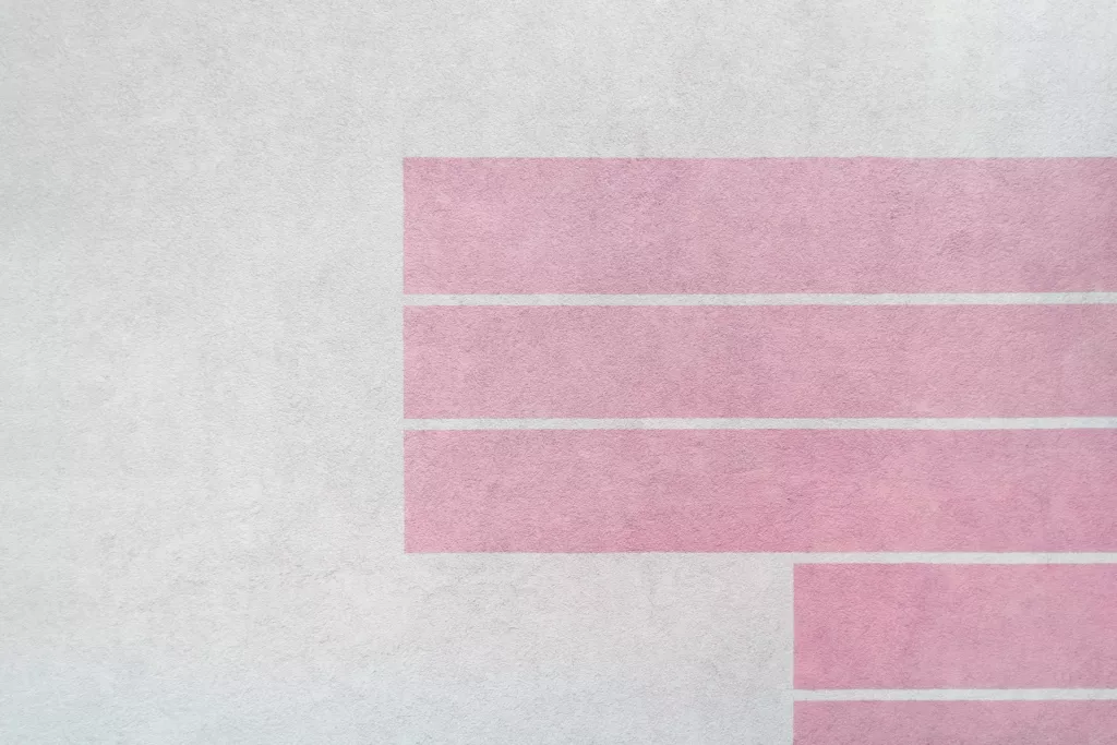 A pink and white abstract painting with horizontal lines photo