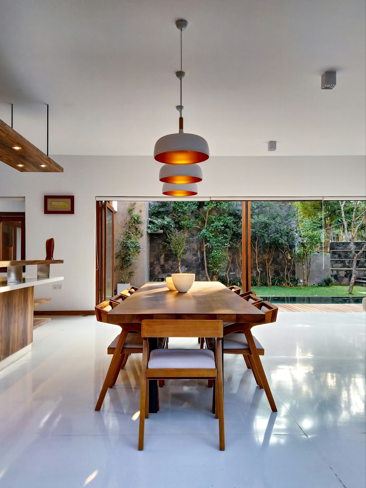 Dining area with a huge wooden table 