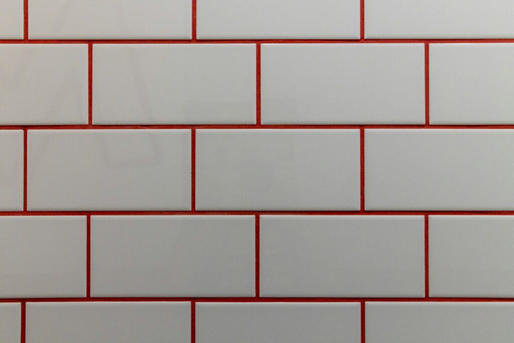 A close up of a white and red brick wall photo