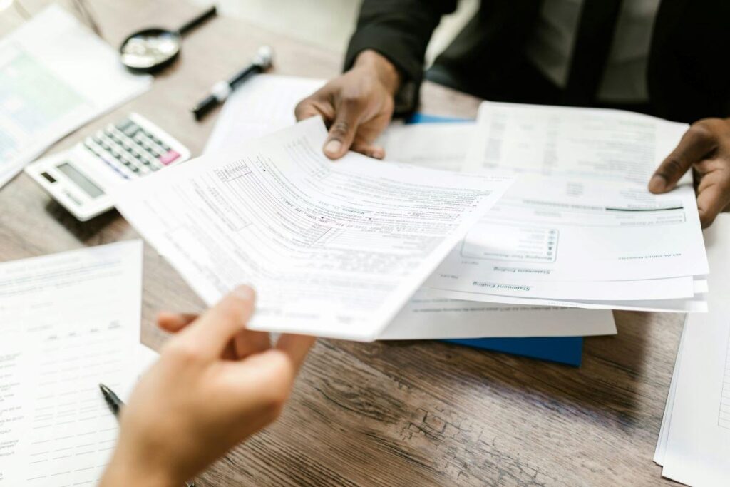 A person holding documents