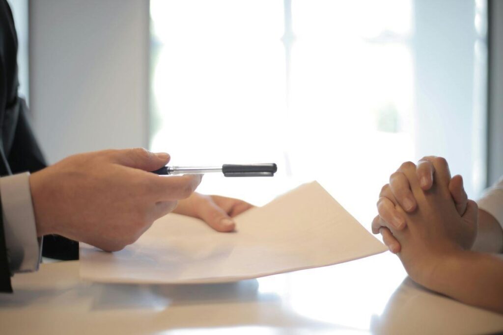 Two people talking over a table